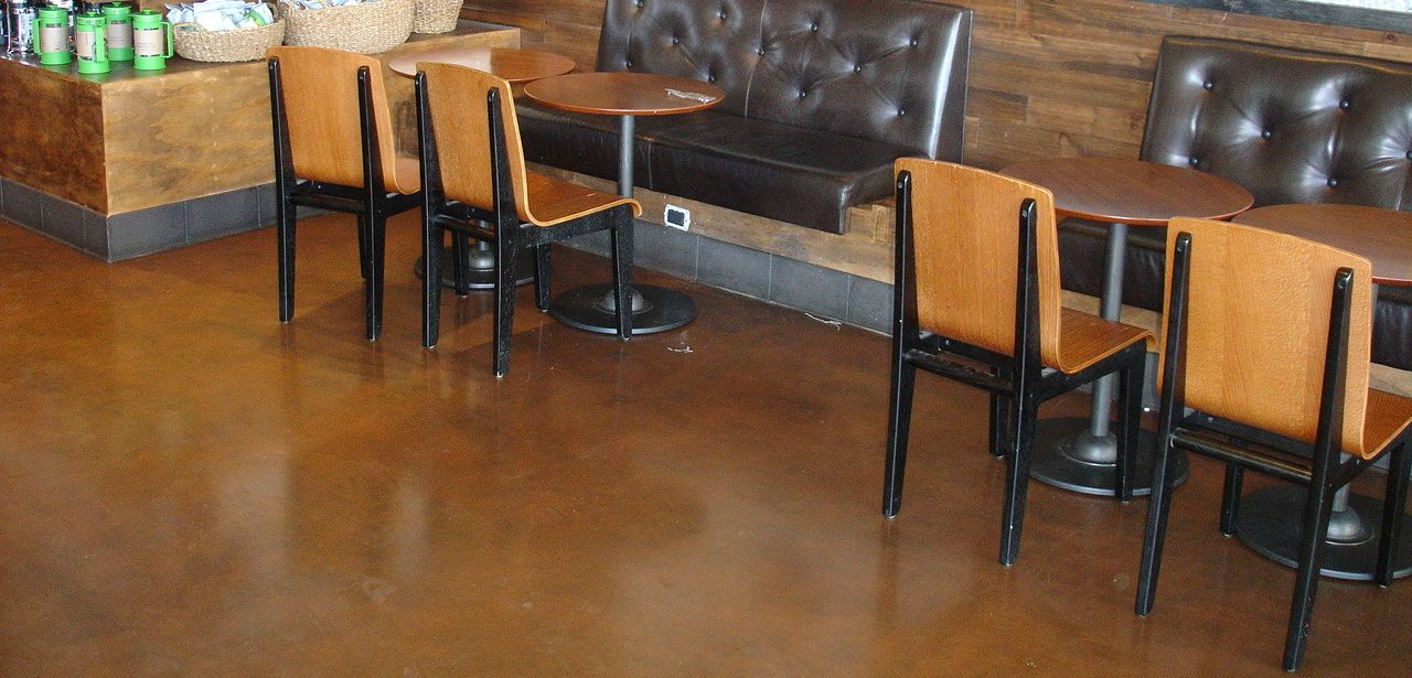 Stained decorative microcement floor in a coffee shop
