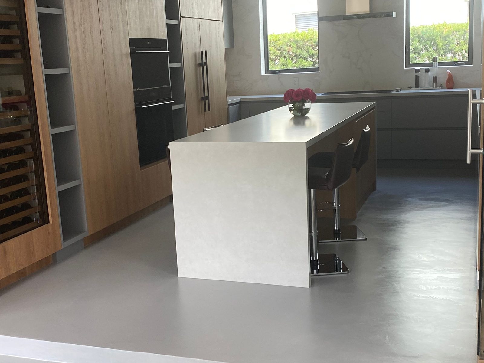 Continuous Baxab Eco microcement kitchen floor with island