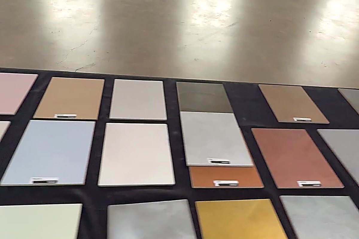 Microcement color sample boards showing the range of finishes